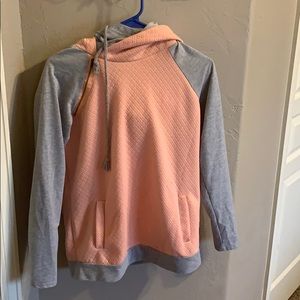 peach and gray pullover sweatshirt